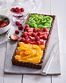 Rainbow cake with berries