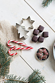 Gingerbread cookies, dominoes and candy canes