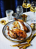 Roast chicken with apricot couscous filling and aubergine butter for Christmas