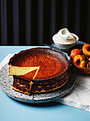 Basque goat's cheesecake with baked peaches