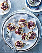 Tarts with coriander, beetroot and bacon jam