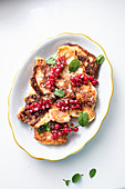 Apple fritters with red currants and mint
