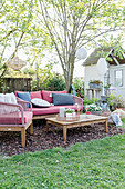 Pleasant seating area with bark chip floor in spring garden