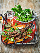 Grilled pork skewers with dipping sauce