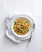 Spaghetti carbonara with peas