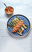 Charred spring onions and romesco