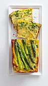Oven-baked frittata made with new potatoes, asparagus and spring onions