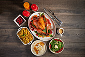 Roast turkey with orange glaze and side dishes