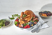 Roast turkey with herbs and berries