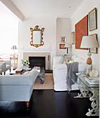 Classic living room with black floor and open fireplace