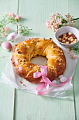 Easter yeast wreath with dried fruits and nuts
