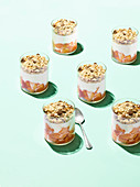 Peach and orange yogurt pots with ginger oats