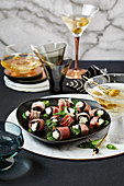 Goat's cheese and prosciutto devils on horseback