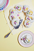 Meringue wreath with eggnog and sugared eggs