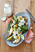 Cos lettuce with roasted corn, chicken, feta cheese and chilli