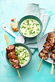 Avocado soup with beef fillet skewers