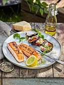 Grilled salmon with eggplant and roasted tomatoes