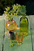 Lady's mantle in glass bottle