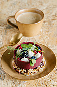 Granola tart with yogurt and berry cream