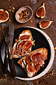 Autumn toasts with goat cheese, figs , walnuts and Parma ham