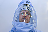 Surgeon wearing surgical hood