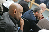 Conference delegates listening to speaker