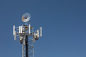 Windmill on communications tower