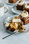 Carrot mini cakes with cream cheese, chocolate and nuts