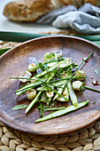 Spring salad with green asparagus, bulrushes and chives
