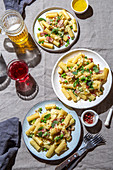 Italian recipe Pasta tortilloni with green pea, mint leaves smoked bacon and cheese
