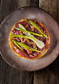 Onion tart with spring onions