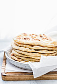 Stack of Six Flatbreads on a plate