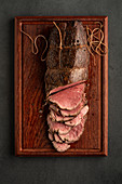 Fillet steak on wood board