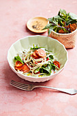 Udon noodles with carrots, spinach, feta cheese and chilli