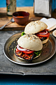 Aubergine and bulgogi burger in a rice flour bun with chilli mayonnaise