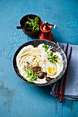 Ramyun soup with soya milk, shoyu egg and shiitake mushrooms (Korea)