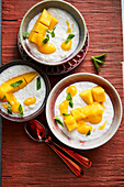 Lemongrass and coconut rice pudding with mango (Asia)