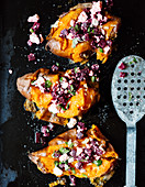 Smashed sweet potatoes with a beetroot and feta cheese salad