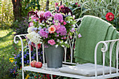 Fragrant late summer bouquet with phlox, hydrangeas, roses, bluebells, amaranth and annual fleabane
