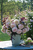 Late summer bouquet made from dahlias, amaranth, autumn asters and Chinese reed flowers