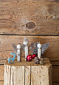 Angels handmade from pieces of wood, beads and feathers