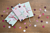 Wrapped gifts and handmade paper garland