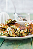 Zucchini fritters with sauce