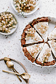 Vegan tart with coconut cream and white currants
