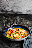 Thai style fish curry with rice noodles and prawns