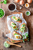 Bruschetta with pea puree and boiled eggs