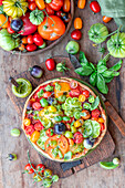 Pie with colorful fresh tomatoes