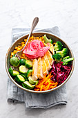 Buddha bowl with corn fed chicken, broccoli, Brussels sprouts, corn, red cabbage and beetroot