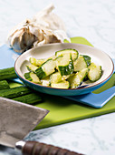 Chunks of cucumber with rice vinegar and garlic