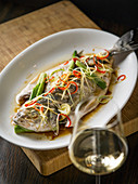 Steamed bass with ginger, spring onions and soy sauce